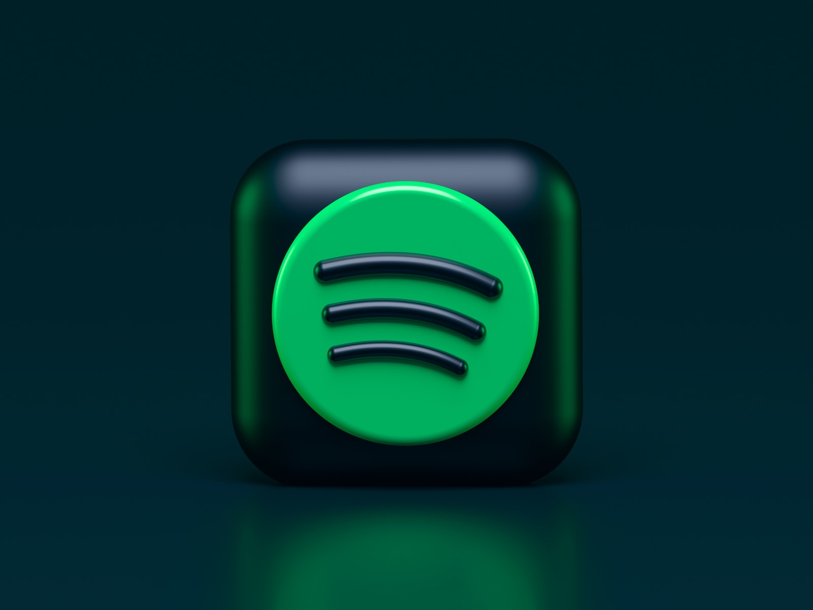 Une icône Spotify verte sur fond sombre.